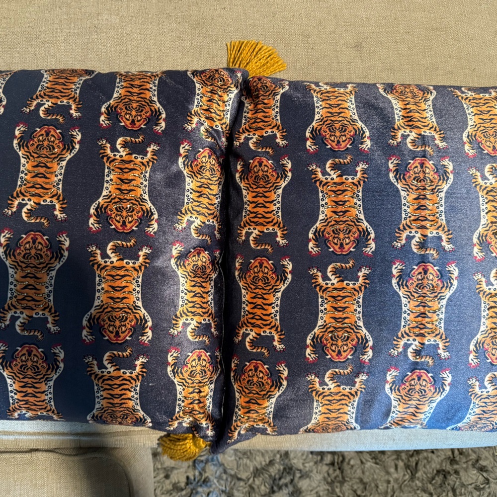 Set of two tiger decorative pillows with tassels